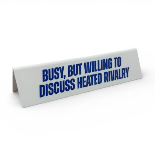 Busy, But Willing To Discuss Heated Rivalry Desk Sign